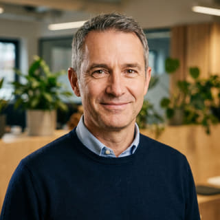 James Mitchell, listed as Chief Executive Officer at Capitark, shown in a profile image