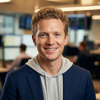 Ryan Brooks, listed as Lead Trading Analyst at Capitark, in a profile image